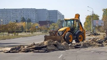 Back Hoe Loader in action