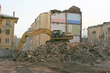 Excavator in a scrap yard