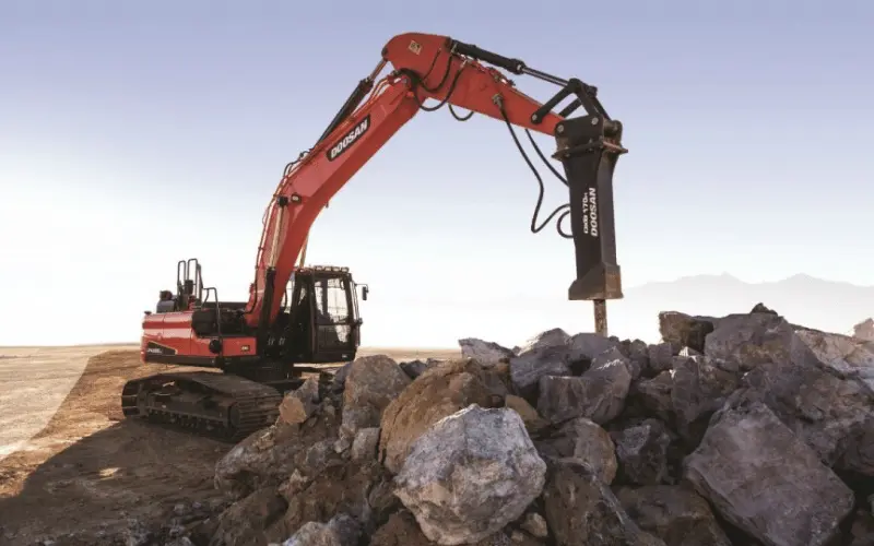 Rock Breaker attachment breaking rock